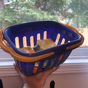 Kids grocery basket with food items